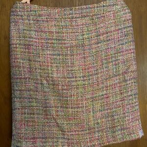 Pink tweed above the knee pencil skirt.